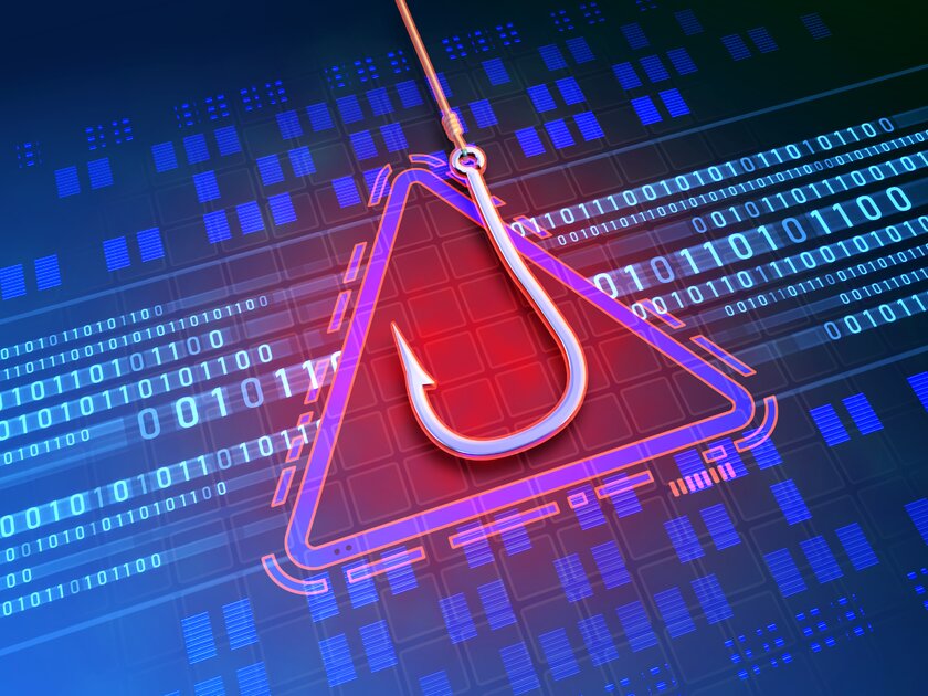 Symbol eines Angelhakens auf einer Platine steht stellvertretend für das Phishing-Prinzip als Hackerangriffsmethode.
