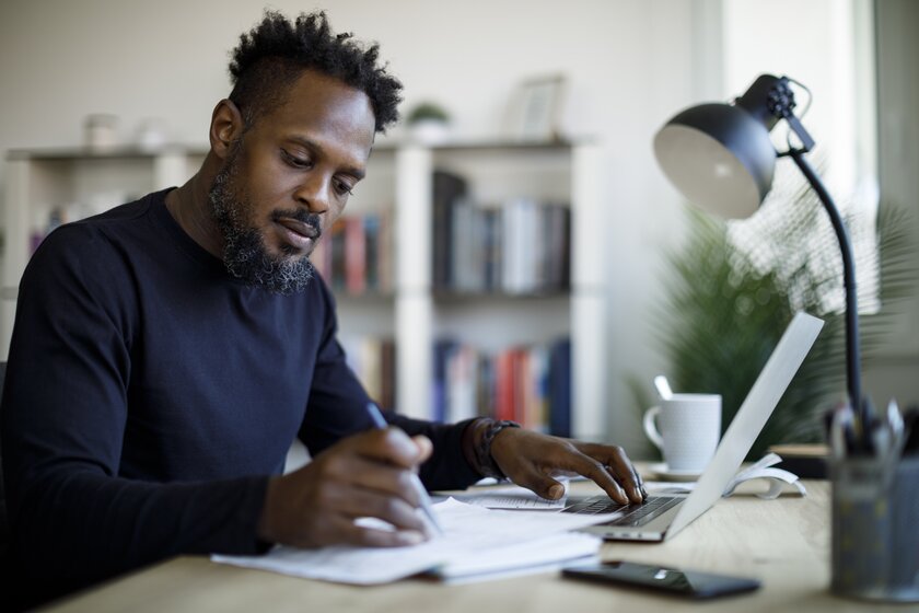 Founder writing a business plan.