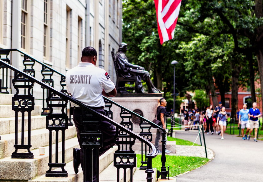 Security Officer at John Harvard Statue, Harvard Court, Harvard University, Cambridge, MA.