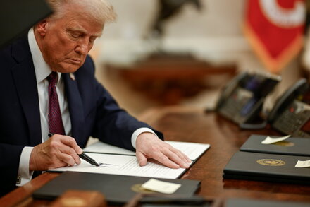 President Trump signs an Executive Order.